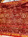 Maroon Full Tissue Saree with Royal Motifs