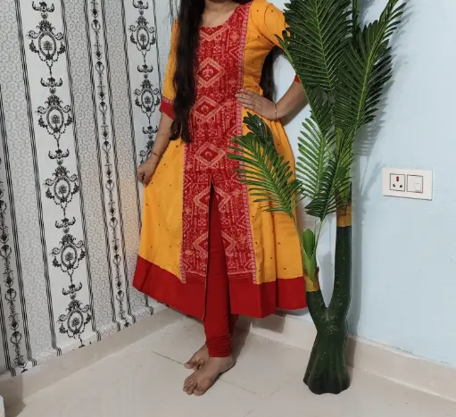 Mustard yellow with red gown