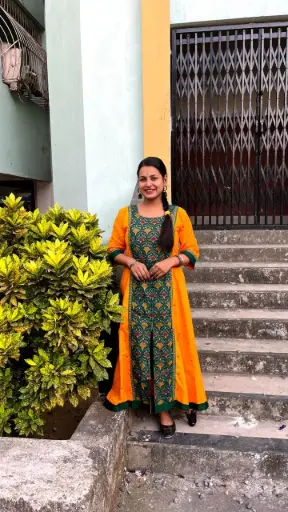 Yellow with green gown